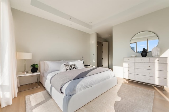 bedroom featuring light wood finished floors