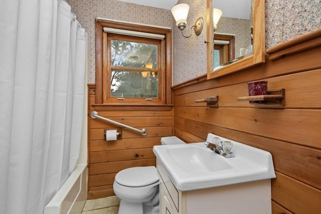 19 Chase St, Taunton, MA 02780 - full bathroom with vanity, wainscoting, tile patterned flooring, wooden walls, and shower / bath combo with shower curtain