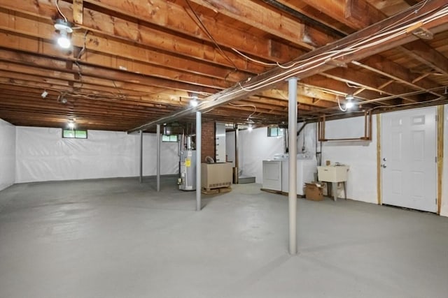 19 Chase St, Taunton, MA 02780 - unfinished below grade area featuring separate washer and dryer and gas water heater