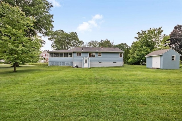 19 Chase St, Taunton, MA 02780 - rear view of house with a storage shed, a yard, and a sunroom