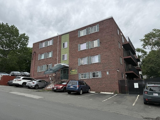 55 Eleanor St Unit 17, Chelsea, MA 02150 - view of property featuring uncovered parking