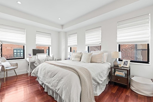 bedroom featuring dark hardwood / wood-style floors