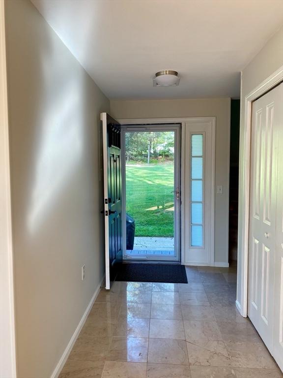 doorway with baseboards