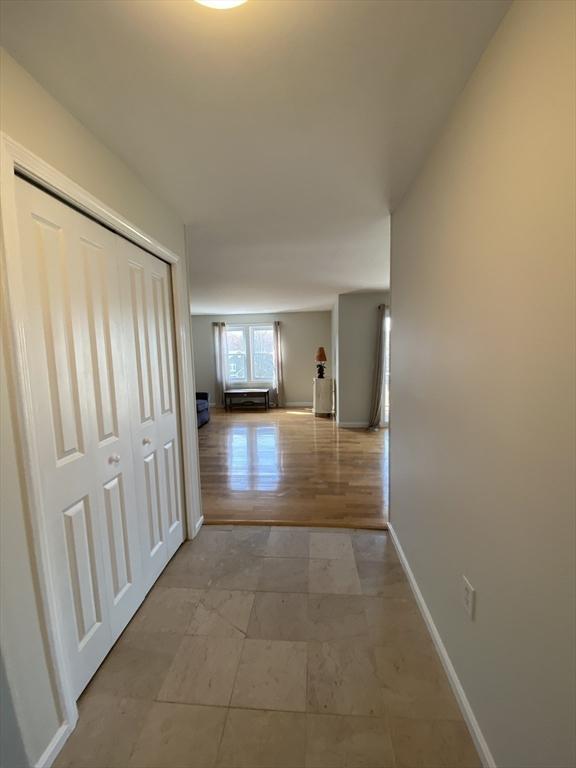 corridor with baseboards