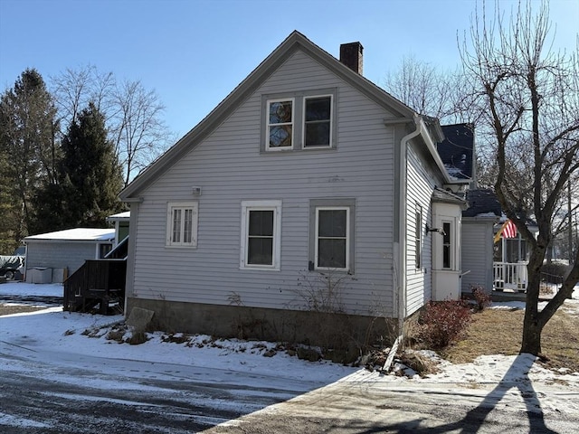 view of snow covered property