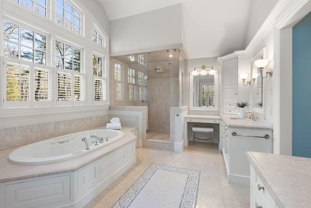 bathroom featuring lofted ceiling, vanity, plus walk in shower, and tile patterned flooring