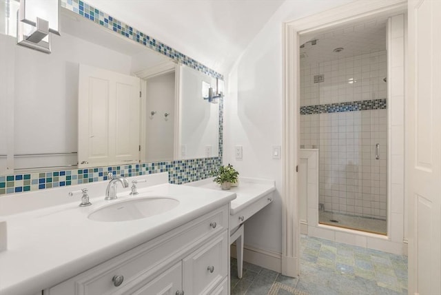 bathroom with lofted ceiling, a shower with door, tile patterned flooring, backsplash, and vanity