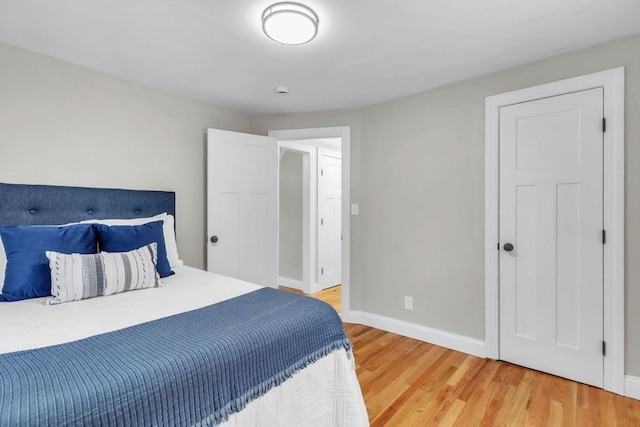 bedroom featuring hardwood / wood-style flooring