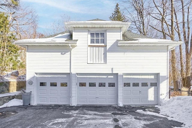 exterior space with a garage