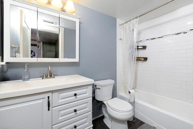 bathroom featuring toilet, vanity, shower / tub combo with curtain, and tile patterned flooring