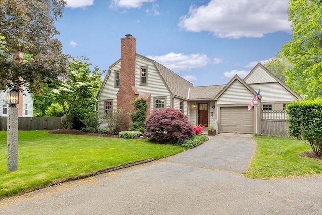 15 Hawthorne Rd, Hingham, MA 02043 - colonial inspired home with a chimney, asphalt driveway, an attached garage, a gambrel roof, and roof with shingles