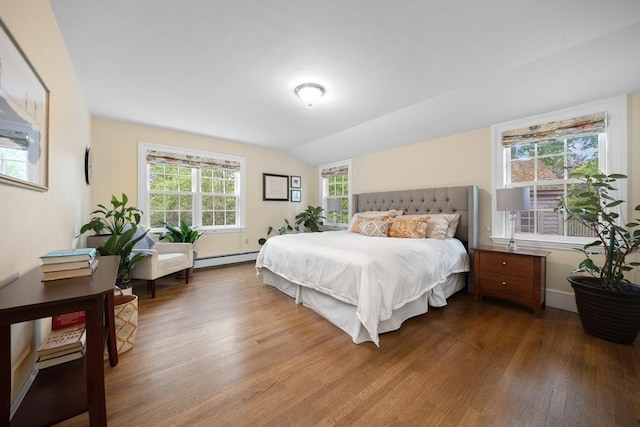 15 Hawthorne Rd, Hingham, MA 02043 - bedroom featuring a baseboard radiator, wood finished floors, and vaulted ceiling
