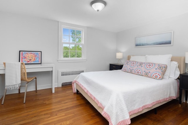 15 Hawthorne Rd, Hingham, MA 02043 - bedroom featuring radiator heating unit and wood finished floors