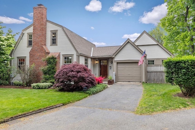 15 Hawthorne Rd, Hingham, MA 02043 - view of front of house with asphalt driveway, a chimney, a garage, roof with shingles, and a gambrel roof