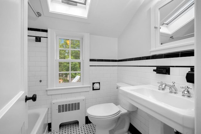 15 Hawthorne Rd, Hingham, MA 02043 - full bathroom with radiator, toilet, tile walls, and shower / bath combination