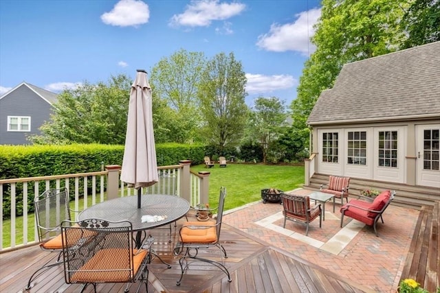 15 Hawthorne Rd, Hingham, MA 02043 - wooden deck featuring outdoor dining area, a lawn, and a fire pit