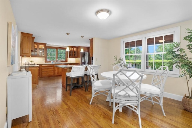 15 Hawthorne Rd, Hingham, MA 02043 - dining room featuring light wood-style floors and baseboards