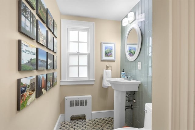 15 Hawthorne Rd, Hingham, MA 02043 - bathroom with radiator, baseboards, toilet, and tile patterned floors