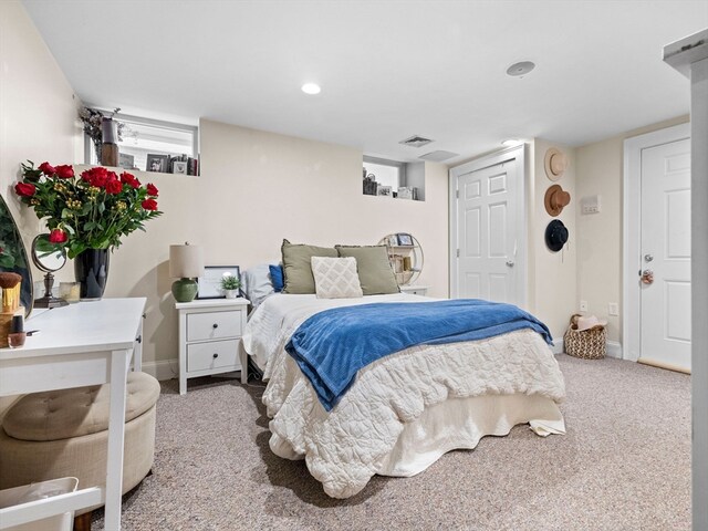 bedroom featuring carpet