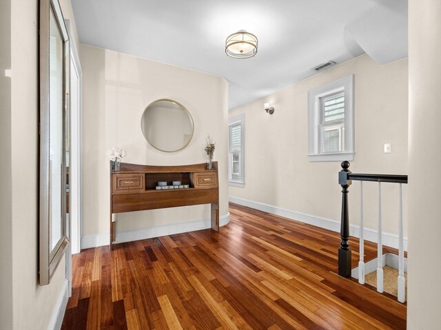 hallway featuring hardwood / wood-style flooring