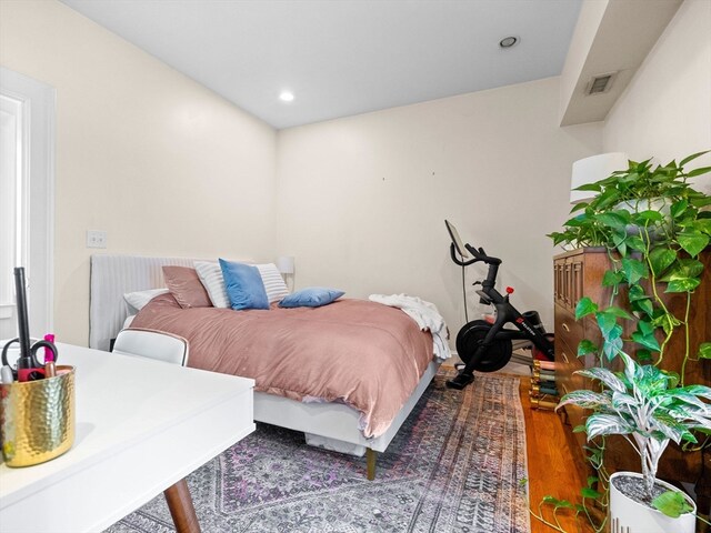 bedroom featuring hardwood / wood-style flooring