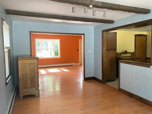 19 Locust Ave, Southbridge, MA 01550 - hall with baseboard heating, light wood-style flooring, and beamed ceiling