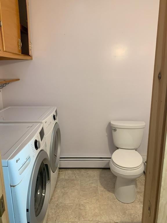 19 Locust Ave, Southbridge, MA 01550 - washroom with a baseboard radiator and washer and clothes dryer