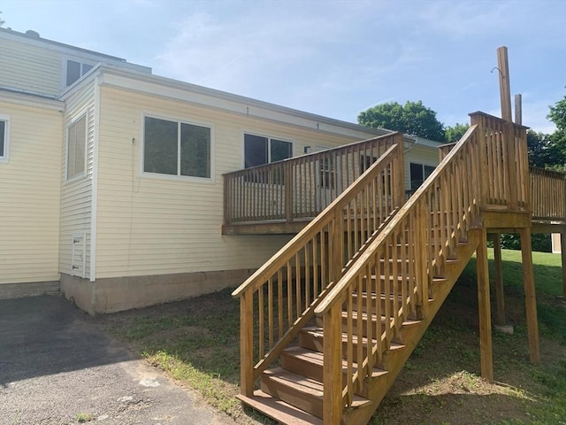 19 Locust Ave, Southbridge, MA 01550 - back of property featuring stairs and a wooden deck