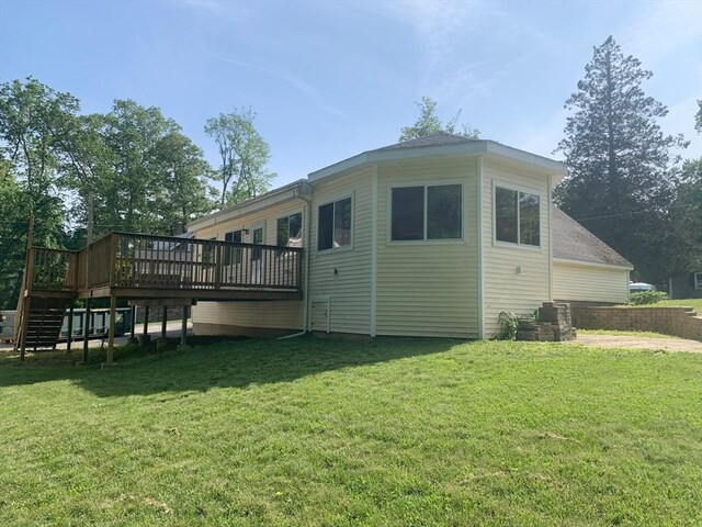 19 Locust Ave, Southbridge, MA 01550 - rear view of house featuring stairway, a deck, and a yard