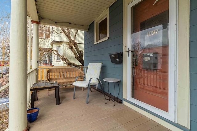 view of patio featuring a porch