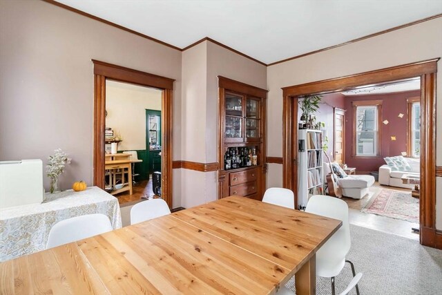 dining room with crown molding