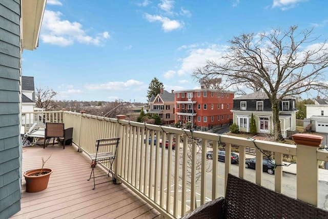 balcony featuring a residential view
