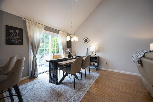 38 Nature View Dr Unit 38, Uxbridge, MA 01569 - dining room featuring a chandelier, wood-type flooring, and high vaulted ceiling