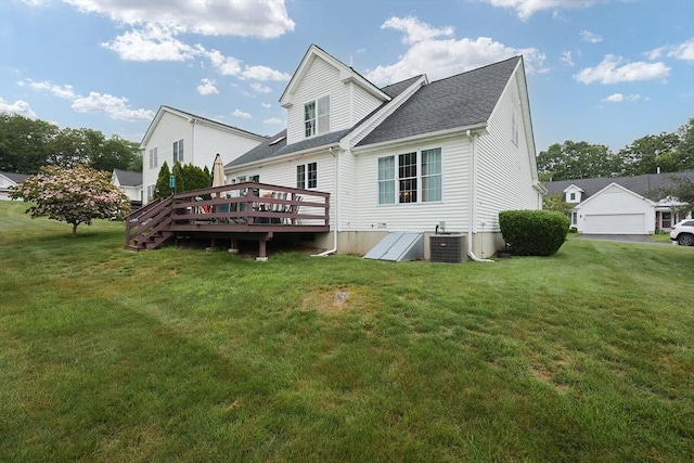 38 Nature View Dr Unit 38, Uxbridge, MA 01569 - rear view of property with a wooden deck, a lawn, and roof with shingles