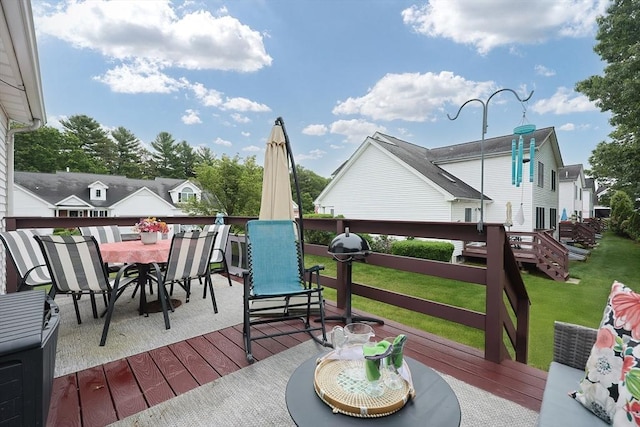 38 Nature View Dr Unit 38, Uxbridge, MA 01569 - deck with outdoor dining space and a lawn