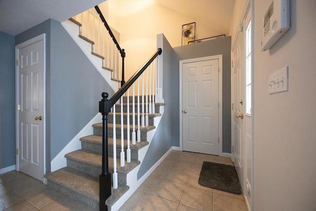 38 Nature View Dr Unit 38, Uxbridge, MA 01569 - foyer featuring tile patterned flooring, stairway, and healthy amount of natural light