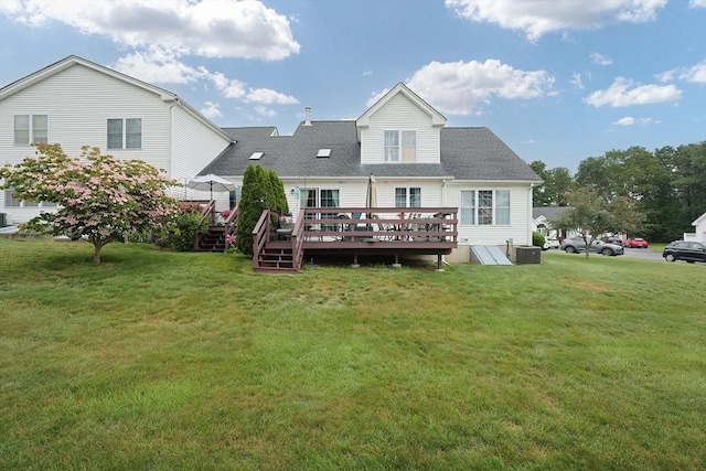 38 Nature View Dr Unit 38, Uxbridge, MA 01569 - rear view of property with a deck, a lawn, and roof with shingles