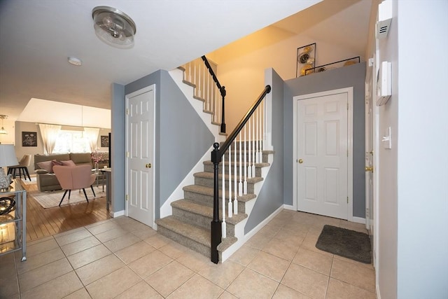 38 Nature View Dr Unit 38, Uxbridge, MA 01569 - entrance foyer featuring light tile patterned floors and stairway