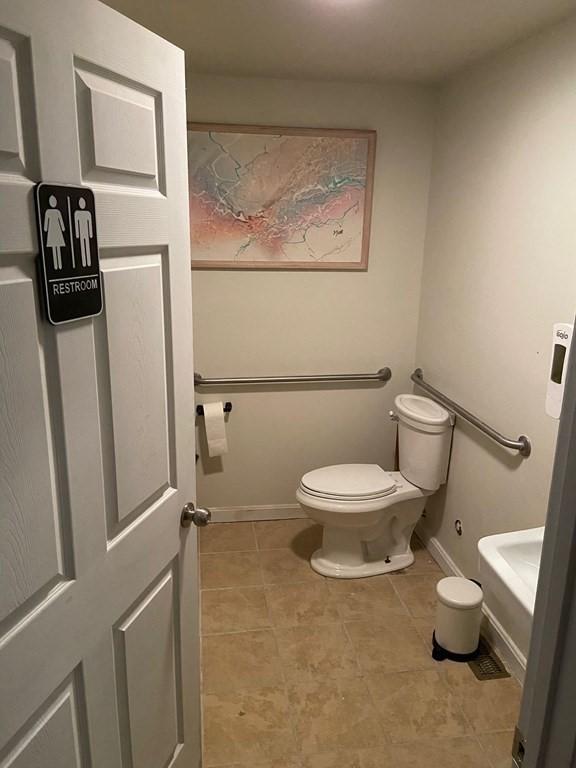 bathroom featuring toilet