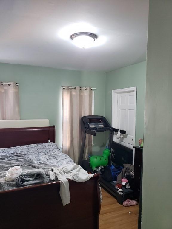 bedroom featuring hardwood / wood-style floors