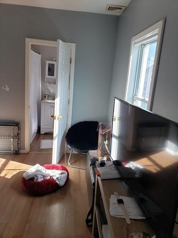 bedroom with light hardwood / wood-style flooring