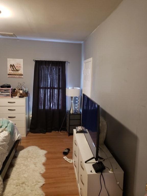 bedroom featuring light hardwood / wood-style floors