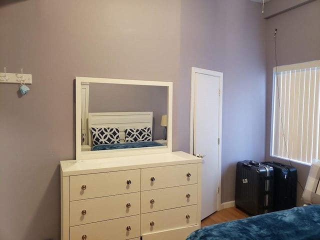 bedroom with light hardwood / wood-style floors