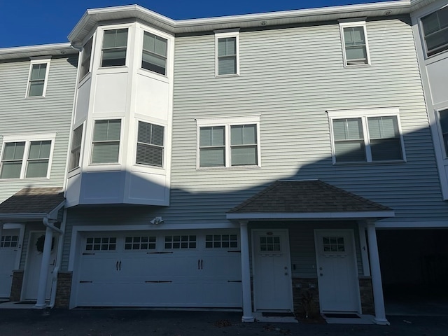 view of property featuring a garage