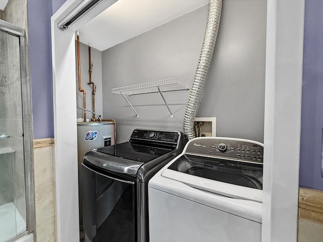 clothes washing area with laundry area and independent washer and dryer