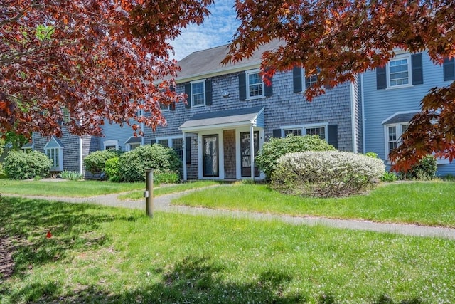 view of front of home with a front lawn