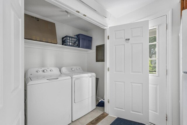 laundry room with separate washer and dryer