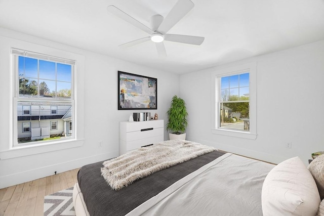 50 Mckinley St Unit 50, Maynard, MA 01754 - bedroom with baseboards, wood finished floors, and a ceiling fan