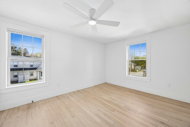 50 Mckinley St Unit 50, Maynard, MA 01754 - spare room with light wood-type flooring, baseboards, and ceiling fan
