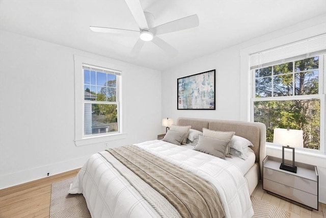 50 Mckinley St Unit 50, Maynard, MA 01754 - bedroom featuring light wood finished floors, ceiling fan, and baseboards